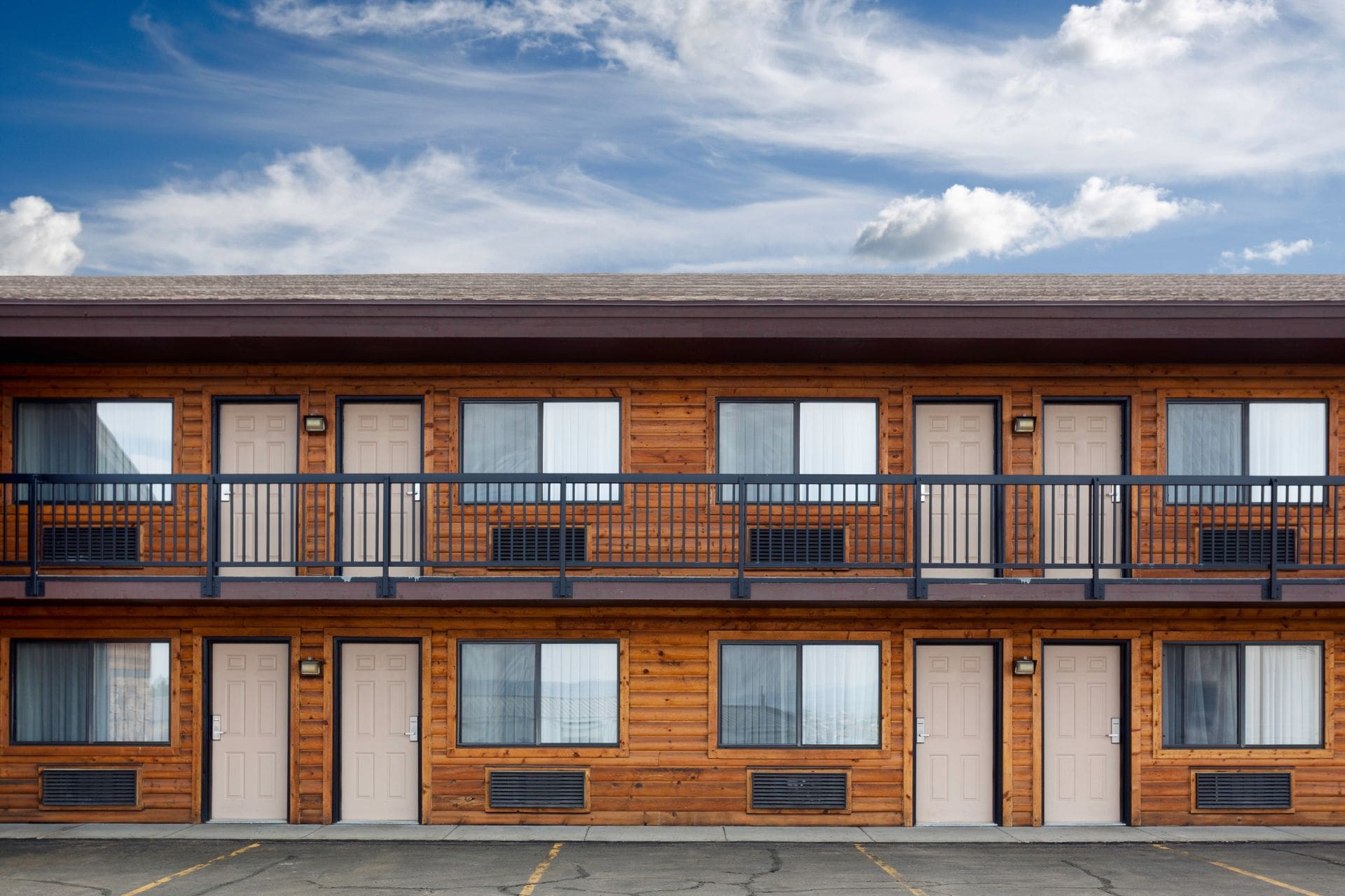 A home in Crossroads receiving expert Commercial Roofing to protect against the relentless summer heat and sudden, fierce thunderstorms that roll in from the bay