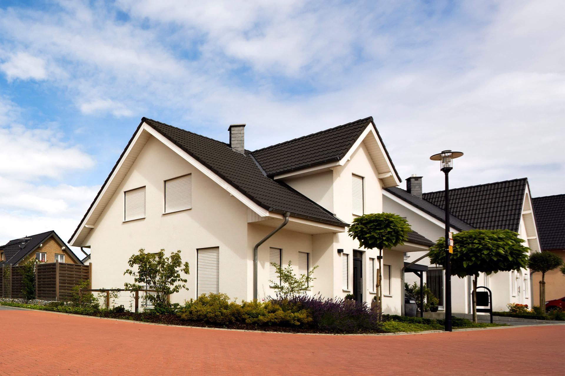 A home in Live Oaks receiving expert Tile Roofing to protect against the relentless summer heat and sudden, fierce thunderstorms that roll in from the bay